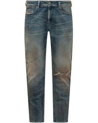 DIESEL - Straight Leg Distressed Jeans - Lyst