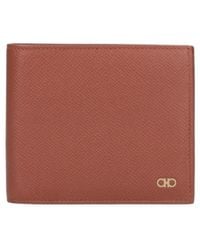 Ferragamo - Ferragamo Gancini Plaque Bi-Fold Wallet - Lyst