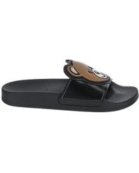 Moschino - Logo Debossed Slip-On Sandals - Lyst