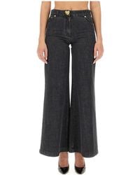 Moschino - Flared-Design Jeans - Lyst