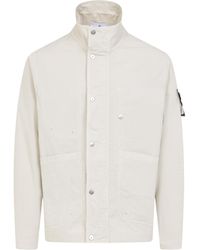 Stone Island - Logo Patch High-Neck Jacket - Lyst