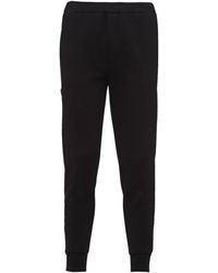 Prada - Logo Plaque Sweatpants - Lyst