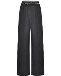 THREE QUARTERS - Logo Wide-Legged Casual Pants - Lyst