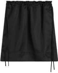 TOTEME - Drawstring Mini Skirt - Lyst