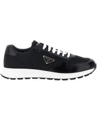 Prada - Leather-Panelled Sneakers - Lyst