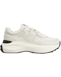 Tod's - Logo Embossed Lace-Up Sneakers - Lyst