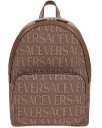 Versace - Allover Logo Printed Backpack - Lyst