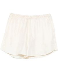 TOTEME - Monogram-Embroidered Silk Shorts - Lyst