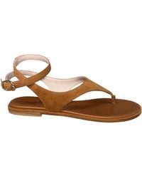 Stuart Weitzman - Buckle Flat Sandals - Lyst