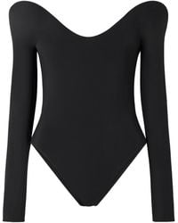 Alaïa - Alaïa Curved Neckline Long-Sleeved Bodysuit - Lyst