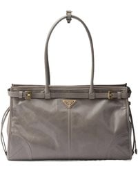 Prada - Triangle-Logo Drawstring Shoulder Bag - Lyst