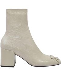 Courreges - Courrèges Zip Detailed Square Toe Ankle Boots - Lyst