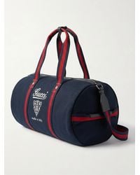 Gucci - Large Printed Canvas Duffle Bag - Lyst
