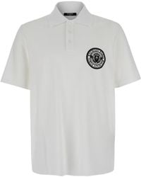 Balmain - Coin-Printed Polo Shirt - Lyst