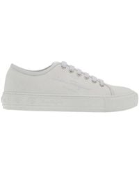 Ferragamo - Logo Embossed Low-Top Sneakers - Lyst