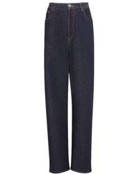 Alaïa - Alaïa Low-Waisted Knit Denim Pants - Lyst