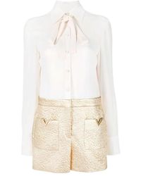 Valentino - Pussy-Bow Long-Sleeved Jumpsuit - Lyst