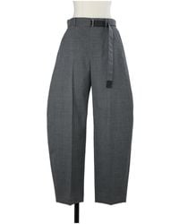 Sacai - Belted Pleated Trousers - Lyst