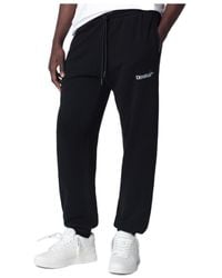 Off-White c/o Virgil Abloh - Heraldic Arrow Cuffed Joggers - Lyst