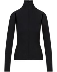 KHAITE - Turtleneck Cut-Out Detailed Top - Lyst