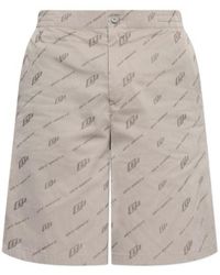 Off-White c/o Virgil Abloh - Button Detailed All-Over Patterned Shorts - Lyst
