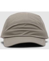 and wander - Pertex Shield Rain Cap - Lyst