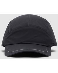 and wander - Pertex Shield Rain Cap - Lyst