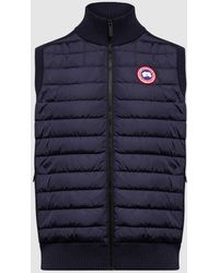 Save 50% Mens Clothing Jackets Waistcoats and gilets Sleeveless Jacket in Atlantic Navy Canada Goose Synthetic Hybridge Lite Blue for Men 