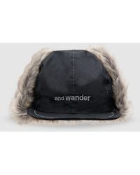 and wander - Rainproof Ear Flap Cap - Lyst