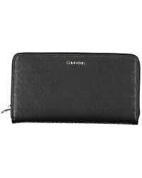 Calvin Klein - Sleek Designer Three-Compartment Wallet - Lyst