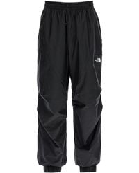 The North Face - Wind Shell Printed Pants - Lyst