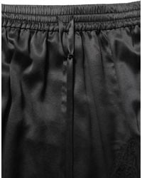 Dolce & Gabbana - Black Lace Trimmed Satin Side Slit Skirt - Lyst