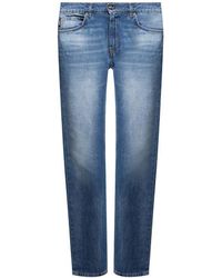 Versace - Cotton Logo Denim Jeans - Lyst