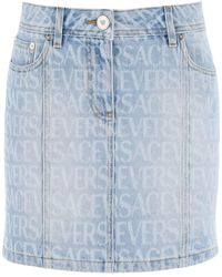 Versace - Allover Denim Miniskirt - Lyst