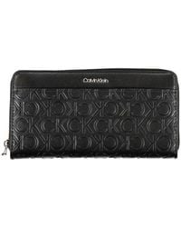 Calvin Klein - Elegant Five-Compartment Designer Wallet - Lyst