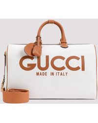Gucci - Beige Duffle Logo Canvas Handbag - Lyst