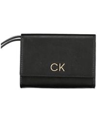 Calvin Klein - Sleek Compact Designer Wallet - Lyst