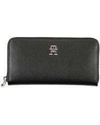 Tommy Hilfiger - Sleek Zippered Wallet With Multiple Compartments - Lyst