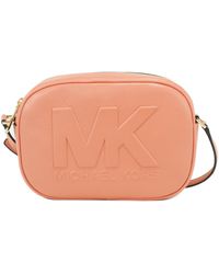 Michael Kors - Jet Set Travel Leather Oval Camera Crossbody Bag Medium - Lyst