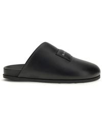 Givenchy - Black Calf Leather Bos Taurus Mules - Lyst