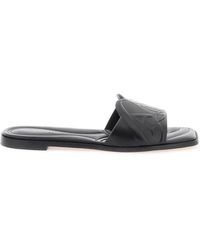 Alexander McQueen - Leather Slides With Embossed Seal Logo - Lyst