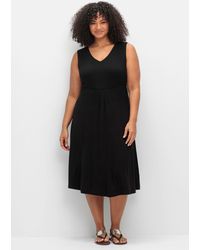 Sheego - Ärmelloses Jerseykleid mit Raffung vorn - Lyst
