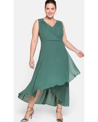 Sheego - Chiffonkleid in Wickeloptik - Lyst