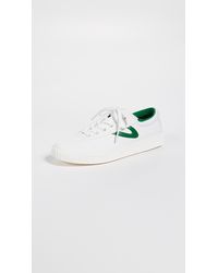 green and white tretorn