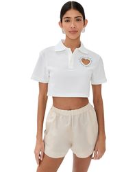 Area - Crystal Heart Cutout Cropped Polo - Lyst