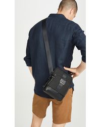 tumi shoulder bags