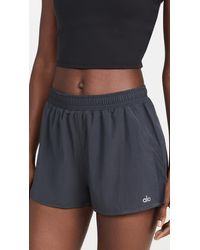 Alo Yoga Stride Shorts in Black Womens Shorts Alo Yoga Shorts Blue 