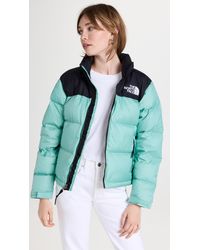 The North Face Synthetic Womens Nuptse Duster In Black | Lyst