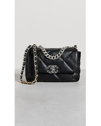 What Goes Around Comes Around Chanel Black Lambskin Pleated Boy
