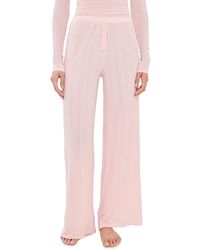 NEGATIVE - Whipped Track Pants - Lyst